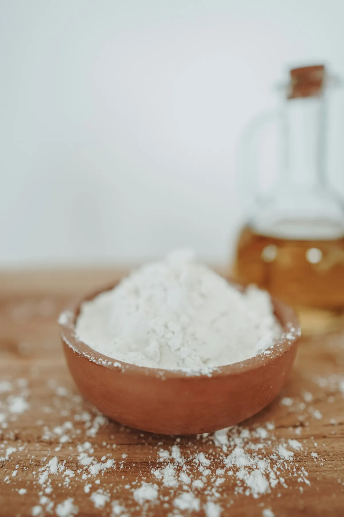 Bowl of baking soda used as a natural odor absorber for musty rooms