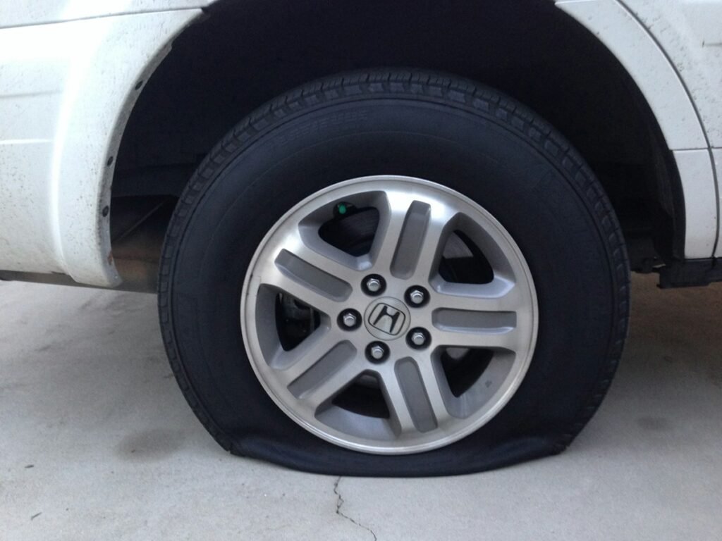 How Long Can You Drive on a Spare Tire? Safe Miles and Speed Limits 3 Car wheel and tire mounted on a vehicle