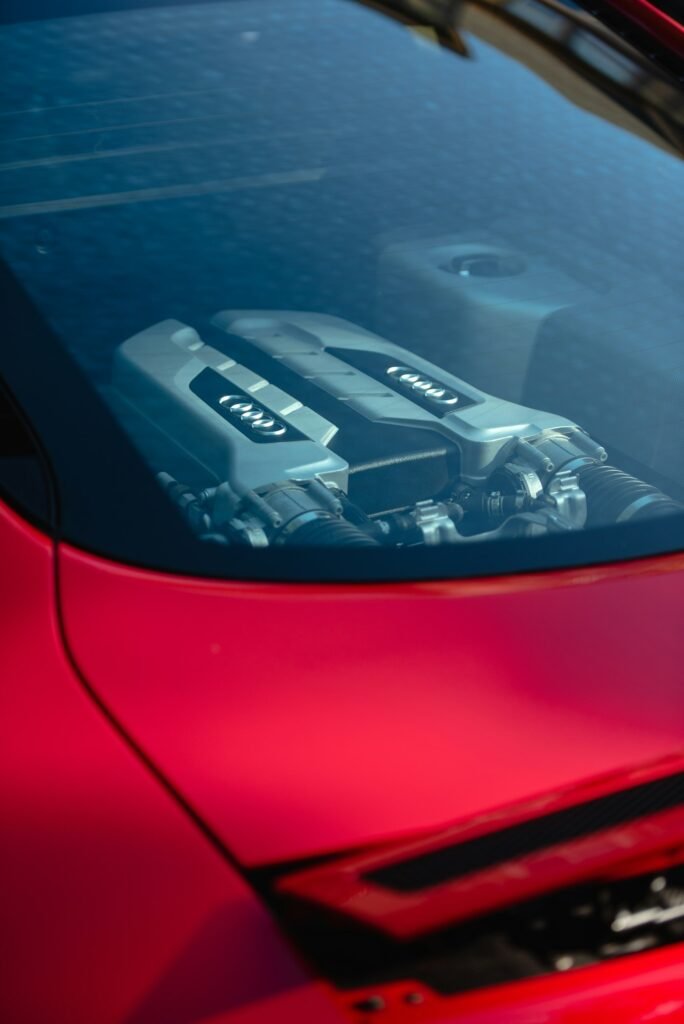How to Check Oil Level in Your Car: A 5-Minute Beginner's Guide 2 Car parked with the hood open, ready for an engine oil check