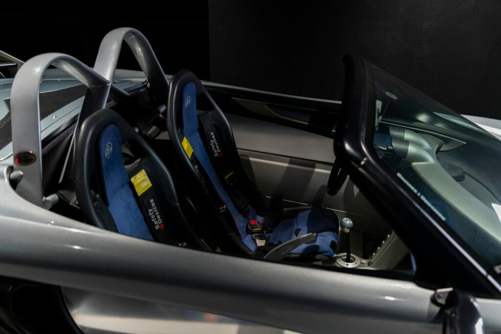 Open car door showing a clean, freshly detailed front seat