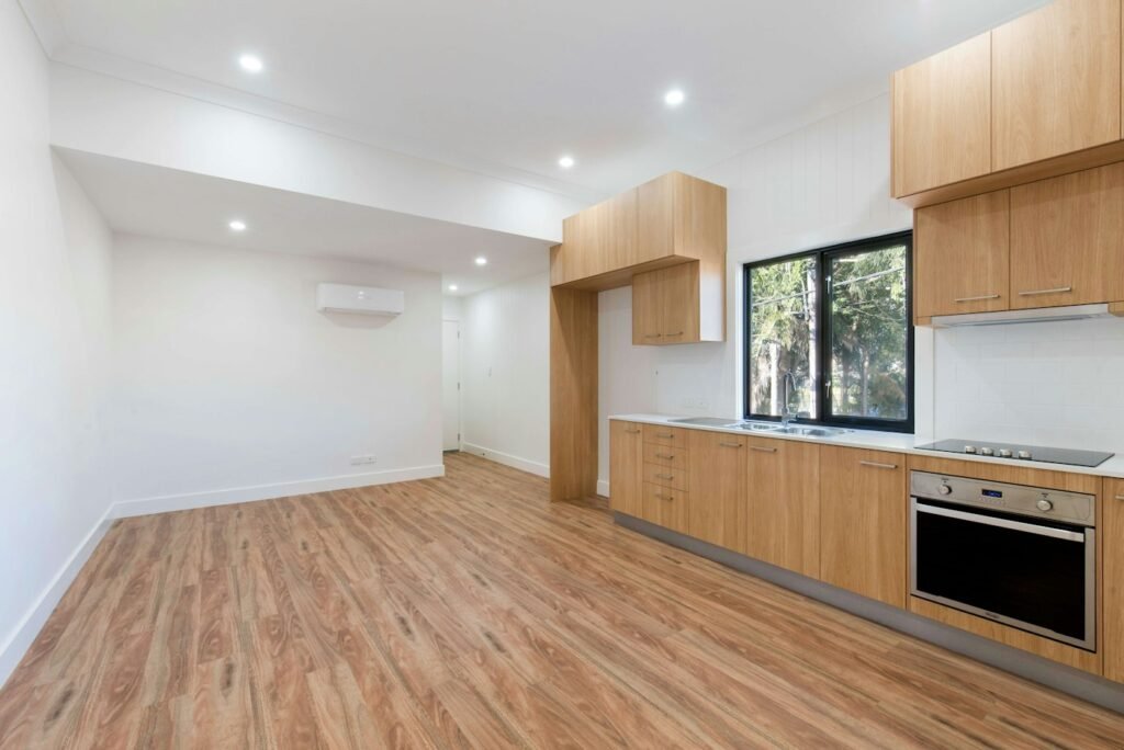 Close-up of brown wooden parquet floorboards where creaks often develop