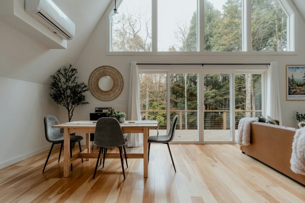 Quiet living room with a solid wooden floor after fixing creaky boards