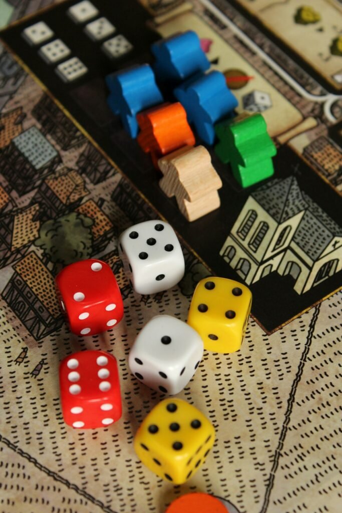 How to Play Left Right Center Dice Game: Rules, Setup and Fun Variations 3 Colorful dice scattered together on a table