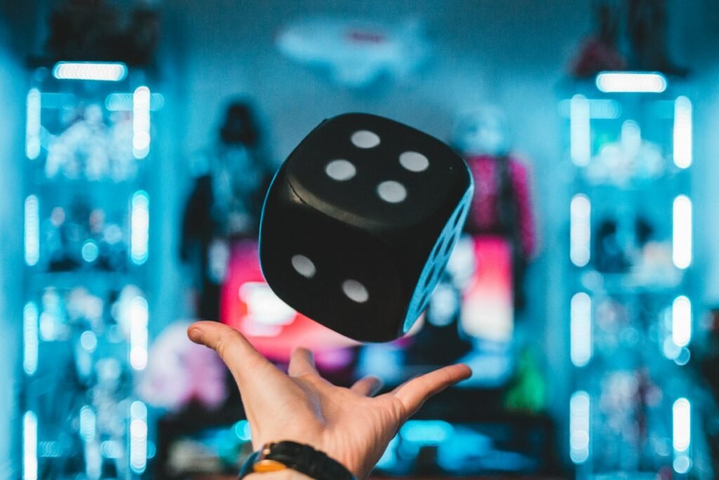 How to Play Left Right Center Dice Game: Rules, Setup and Fun Variations 4 Hand about to catch a rolled die during a dice game