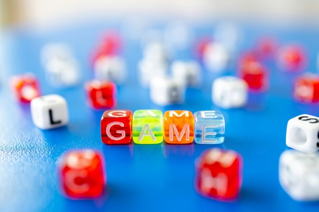 How to Play Left Right Center Dice Game: Rules, Setup and Fun Variations 5 Colorful letter cubes spelling the word game