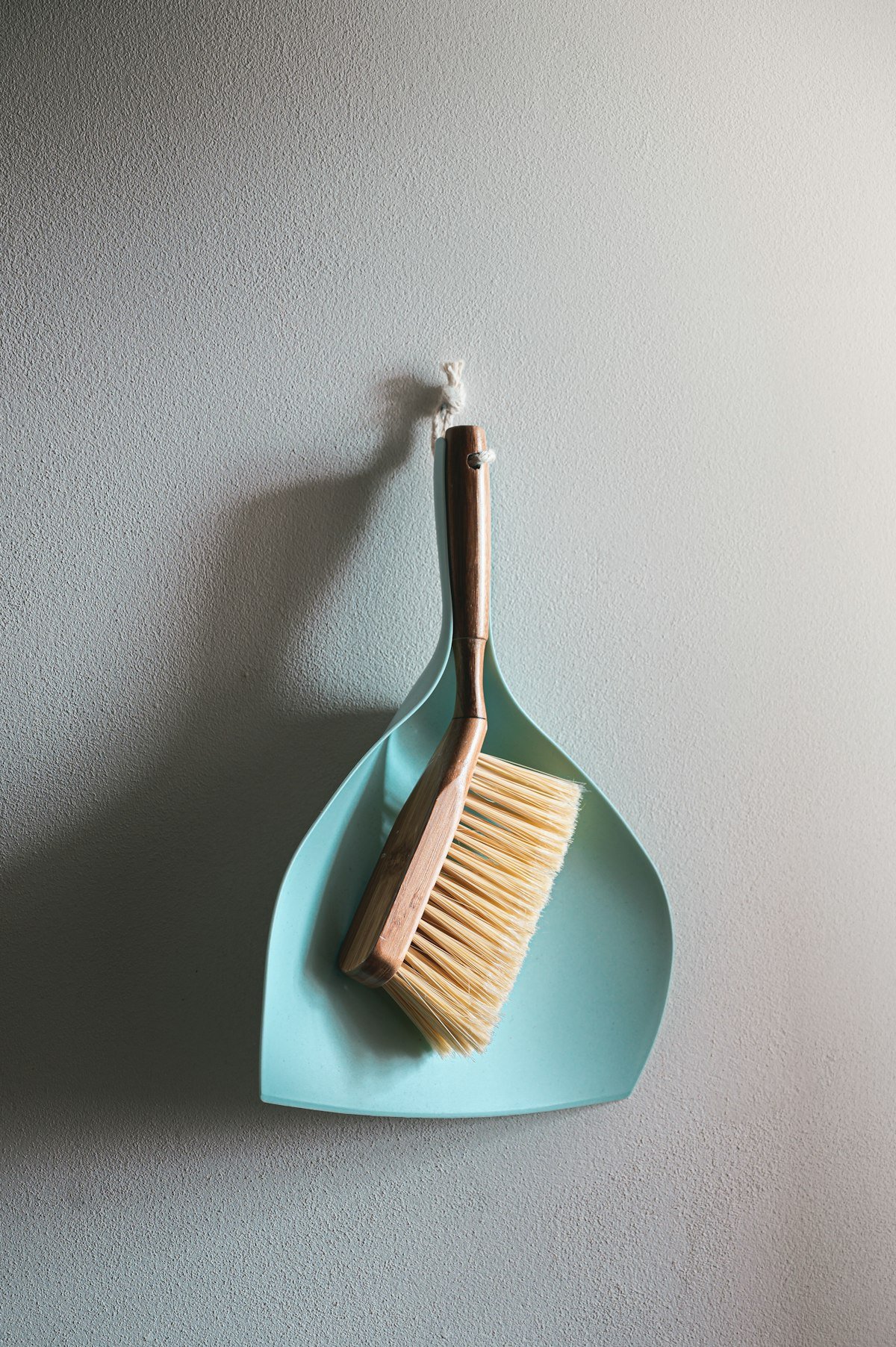 Wooden scrub brush for cleaning grout lines